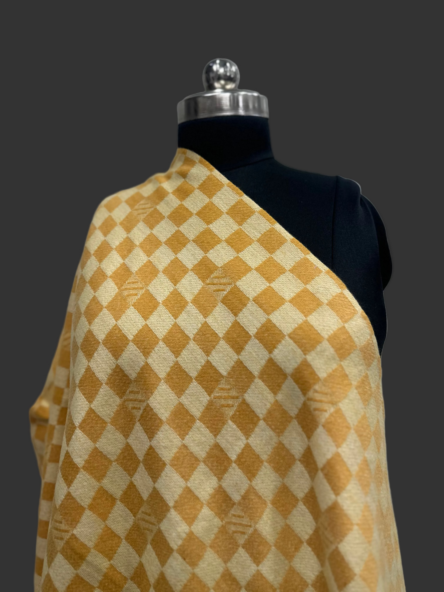 Crafted with a soft, mid-weight drape, it’s designed to be versatile—wrap it classic for a sharp office look, or drape it over your shoulders as an elegant evening shawl.